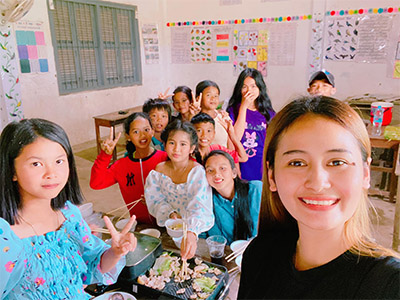With her students, 2022